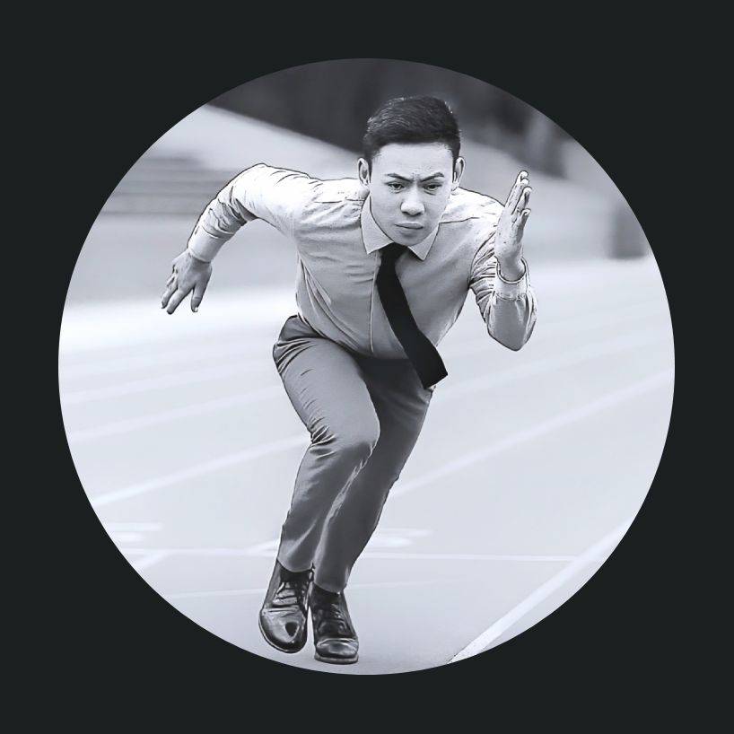 Businessman in a running sprint posture showing agility.